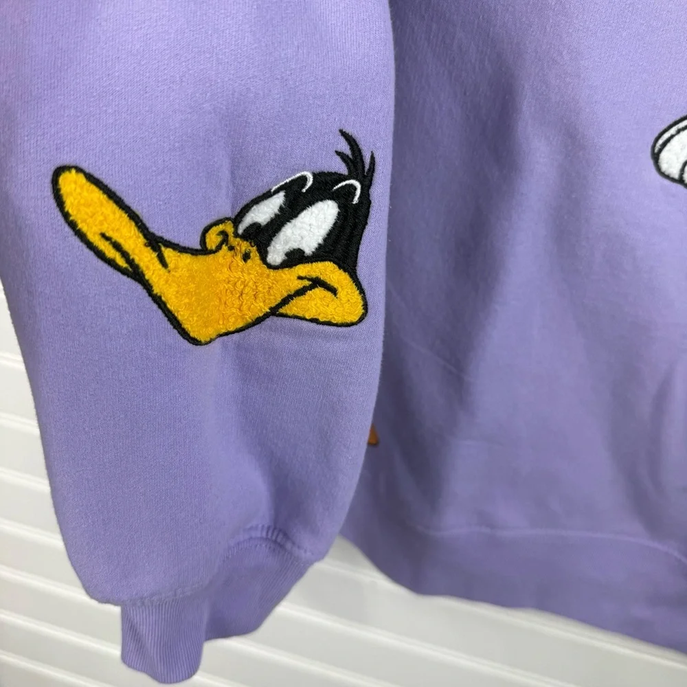 Warner Bros. Lavender purple Looney Tunes Graphic Crewneck Sweatshirt. Juniors L